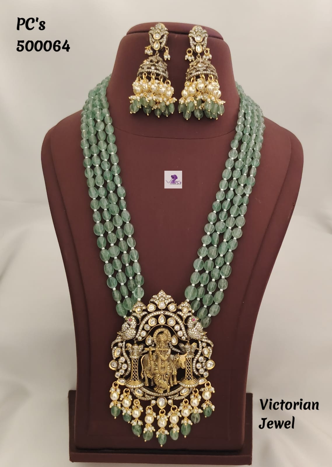 Show details for Green Beads Necklace with Victorian Krishna pendant Picture of Green Beads Necklace with Victorian Krishna pendant