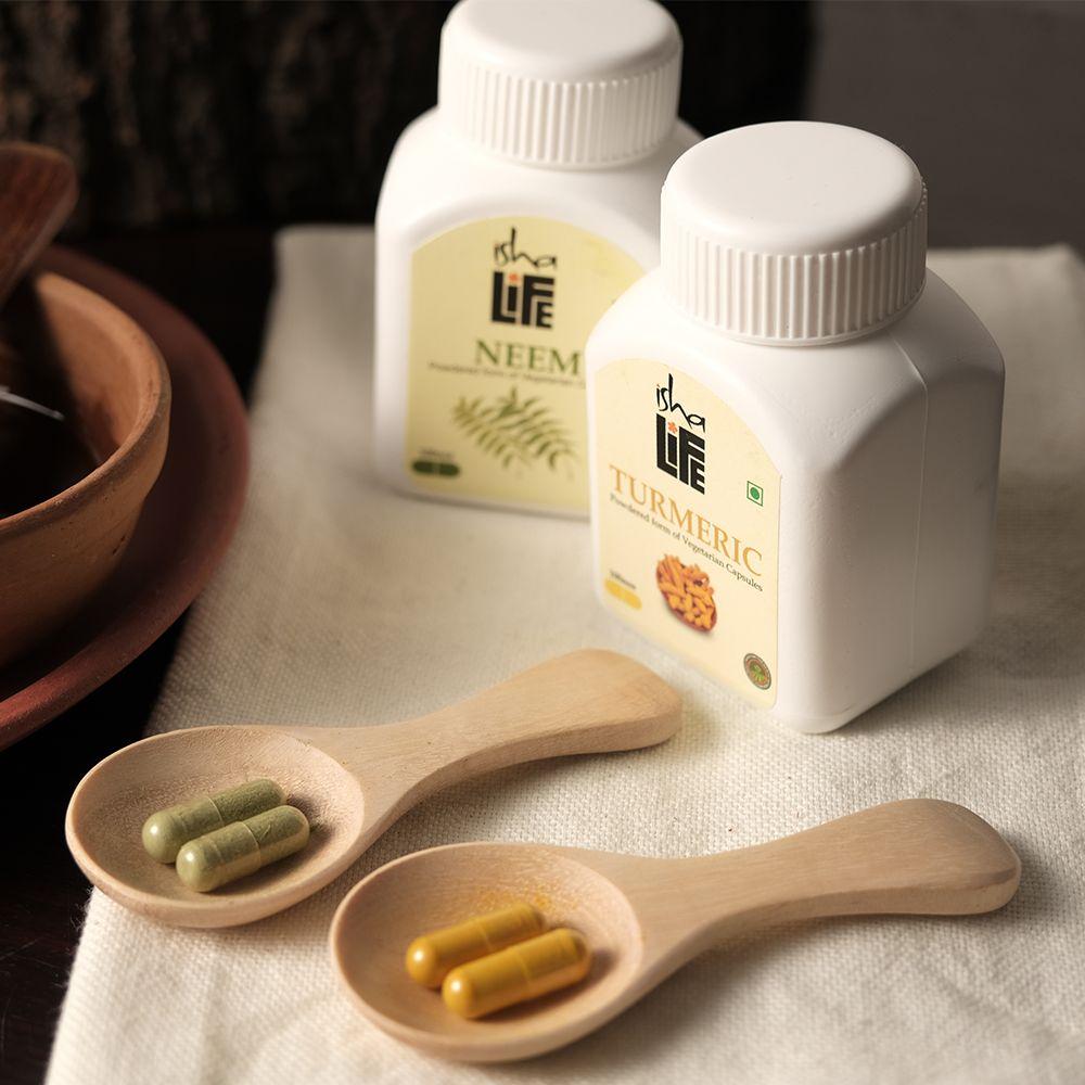 Show details for Isha Life Neem and Turmeric powder in veg capsules. Combo pack. 100 capsules each. For daily detox. Picture of Isha Life Neem and Turmeric powder in veg capsules. Combo pack. 100 capsules each. For daily detox.