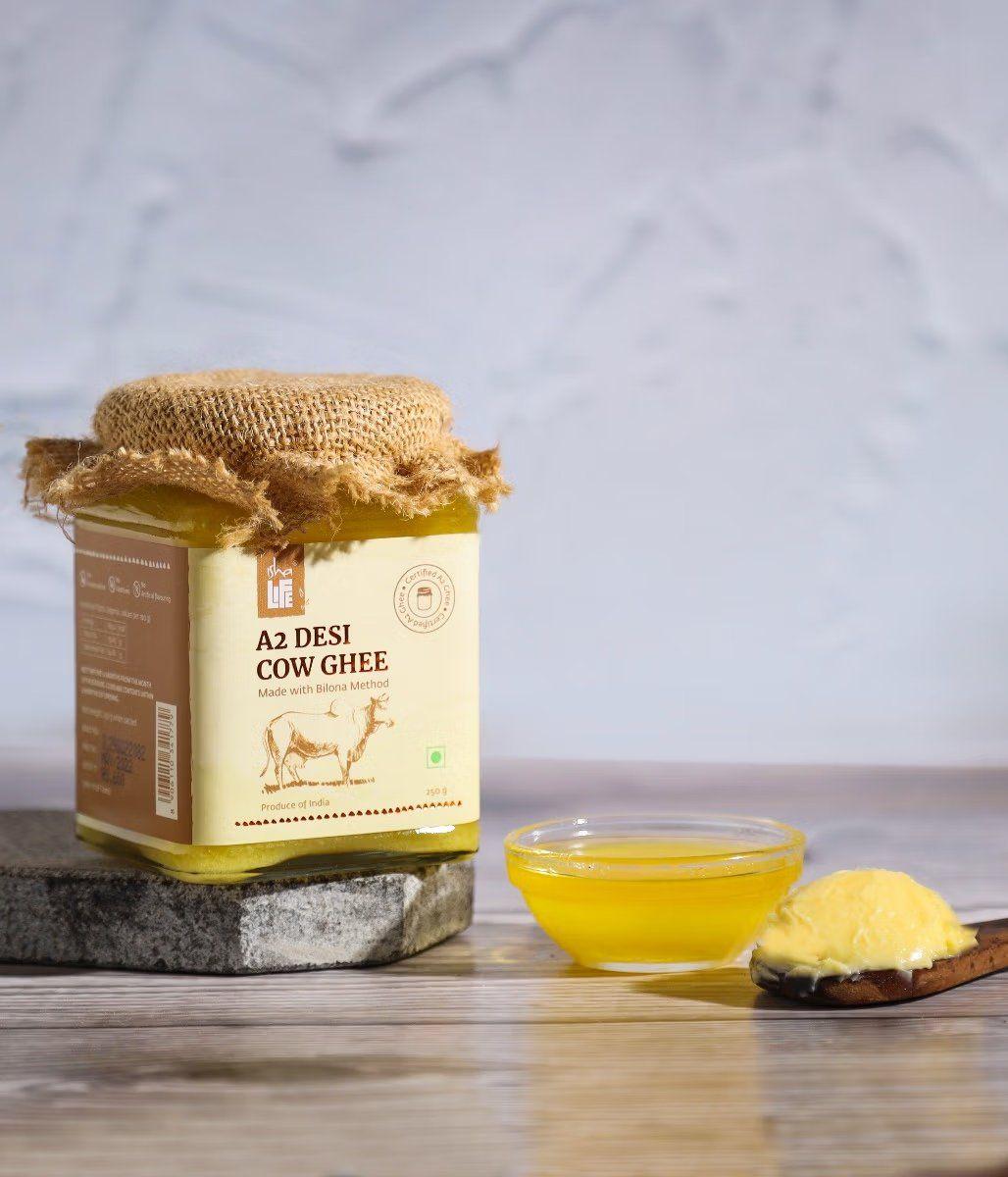 Show details for Isha Life Pure A2 Desi Cow Ghee(250gm). Made traditionally from curd. Made from grass-fed free grazing desi cows' milk. Extracted using non-exploitative methods. Bilona ghee Picture of Isha Life Pure A2 Desi Cow Ghee(250gm). Made traditionally from curd. Made from grass-fed free grazing desi cows' milk. Extracted using non-exploitative methods. Bilona ghee