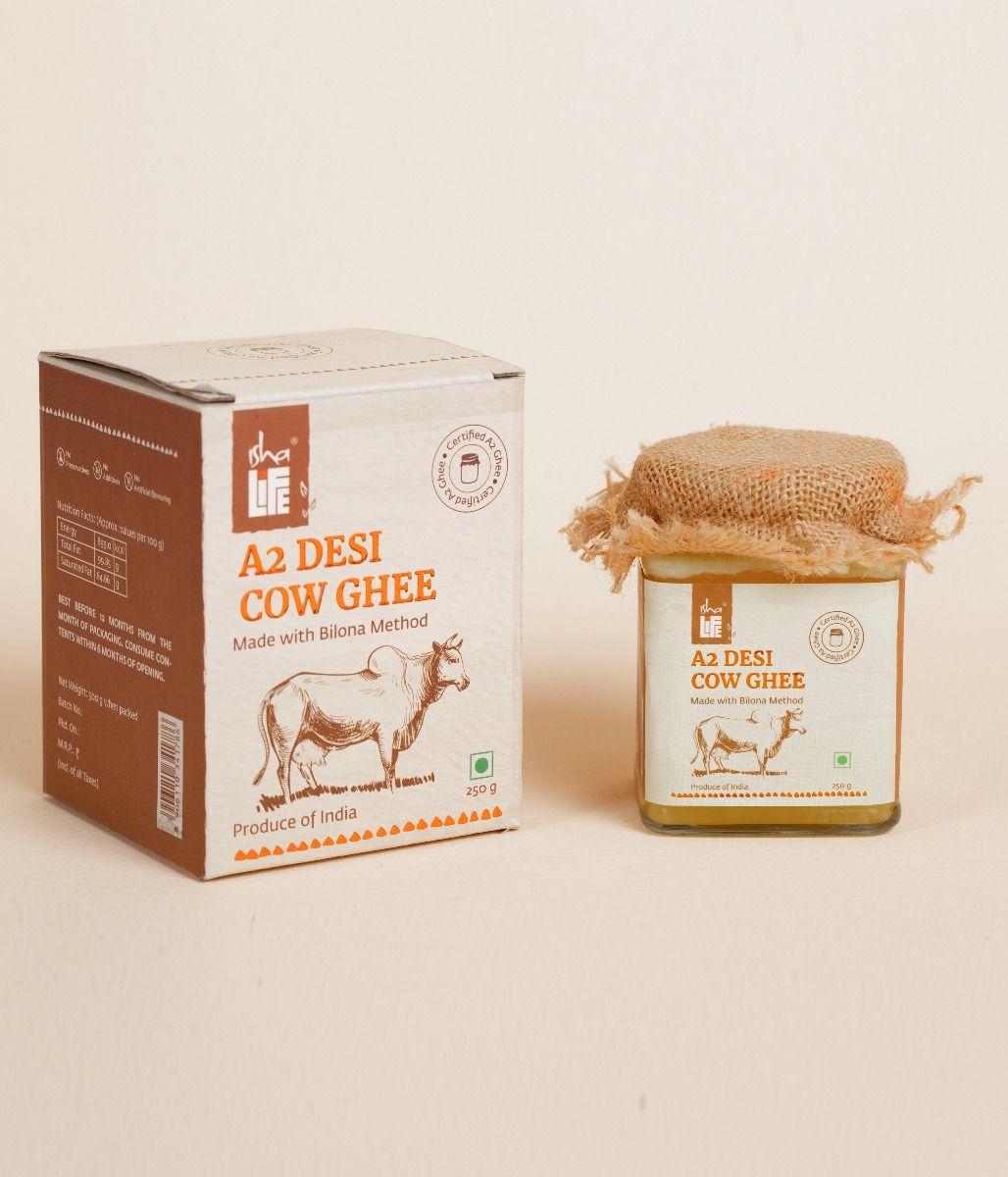 Picture of Isha Life Pure A2 Desi Cow Ghee(250gm). Made traditionally from curd. Made from grass-fed free grazing desi cows' milk. Extracted using non-exploitative methods. Bilona ghee