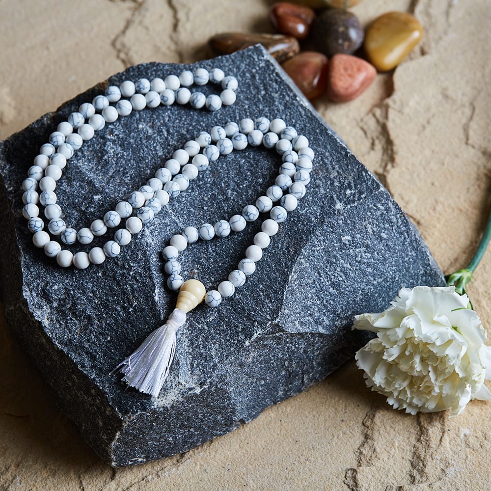 Show details for Svastika Ethereal Howlite Meditation Beads Mala Picture of Svastika Ethereal Howlite Meditation Beads Mala