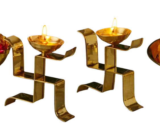 Show details for Svastika Vertical Swastika Symbol Diya Brass Akhand Jyoti Diya for Pooja - Set of 2 Picture of Svastika Vertical Swastika Symbol Diya Brass Akhand Jyoti Diya for Pooja - Set of 2