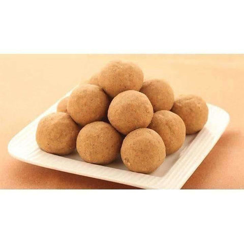 Show details for Vellanki Foods Bellam Sunnundalu (Jaggery) - 1 KG Picture of Vellanki Foods Bellam Sunnundalu (Jaggery) - 1 KG