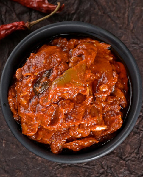 Show details for Vellanki Foods Andhra Special Tomato Pickle with Garlic  Picture of Vellanki Foods Andhra Special Tomato Pickle with Garlic