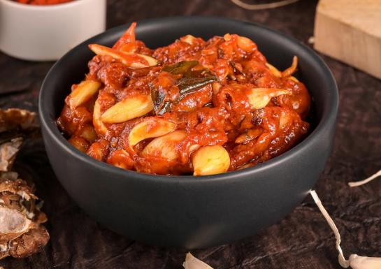 Show details for Vellanki Foods Garlic Pickle - 1 KG Picture of Vellanki Foods Garlic Pickle - 1 KG