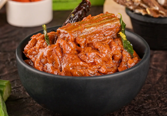 Show details for Vellanki Foods Drumstick Pickle - 1KG Picture of Vellanki Foods Drumstick Pickle - 1KG