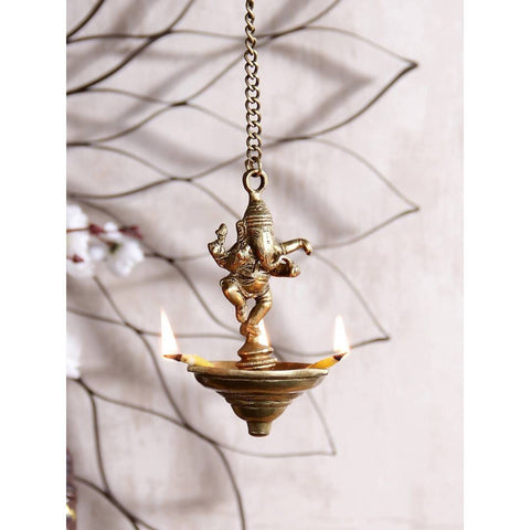 Show details for eCraftIndia Brown Dancing Ganesha Brass Hanging Diya Picture of eCraftIndia Brown Dancing Ganesha Brass Hanging Diya