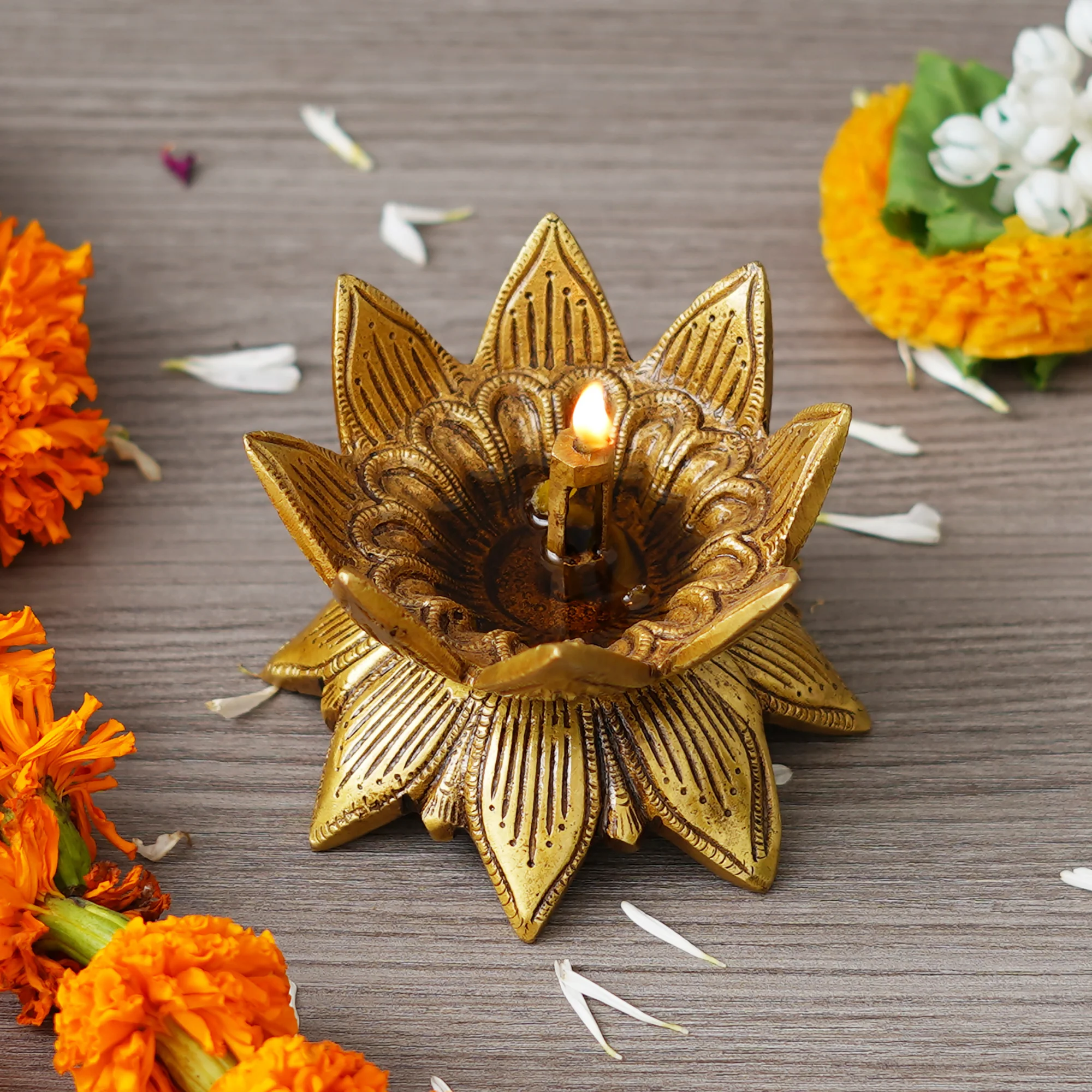 Show details for eCraftIndia Gold Toned Lotus Flower Designer Brass Diya Picture of eCraftIndia Gold Toned Lotus Flower Designer Brass Diya