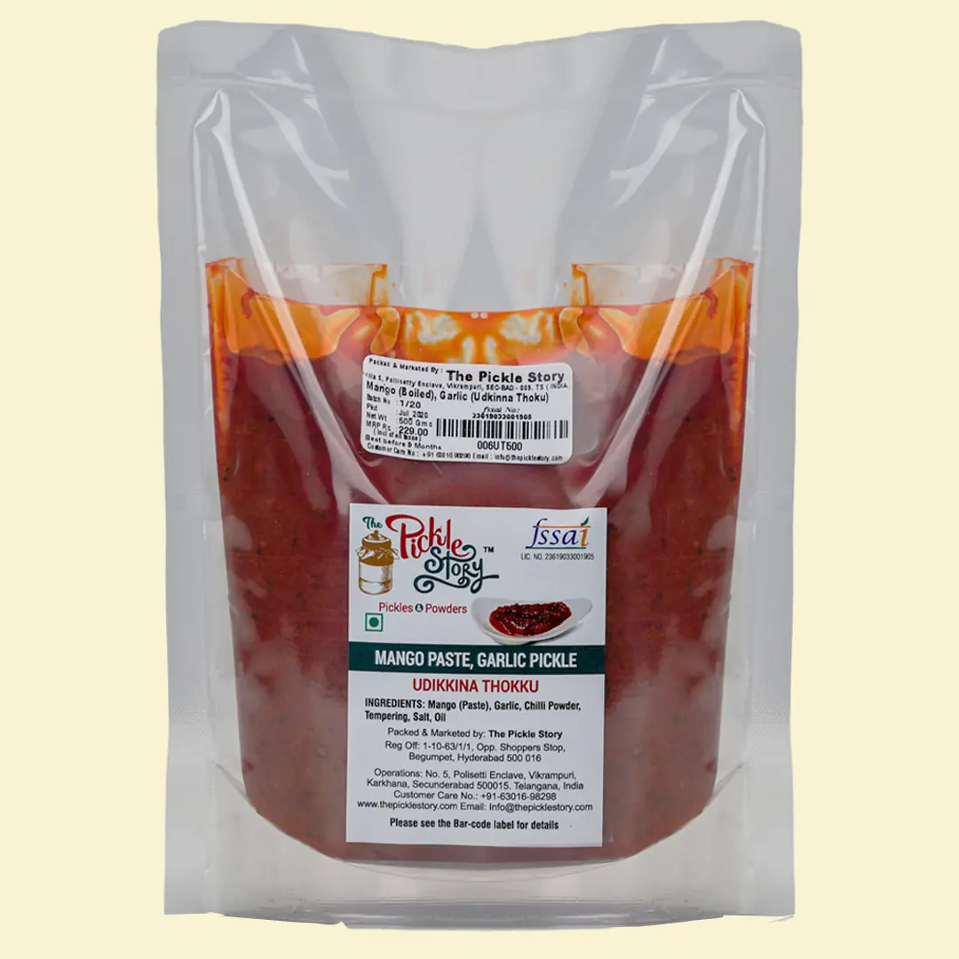 Show details for The Pickle Story Mashed Mango with Garlic Pickle – Udikkina Thokku - 500 GM Picture of The Pickle Story Mashed Mango with Garlic Pickle – Udikkina Thokku - 500 GM